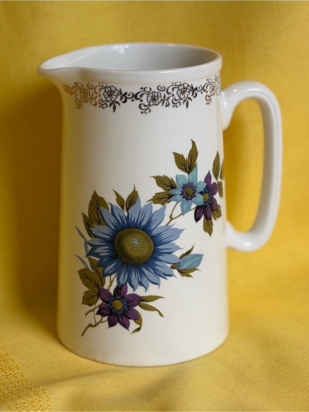 Lord Nelson Pottery Ceramic Floral Pitcher in Cream with Blue and Purple Flowers